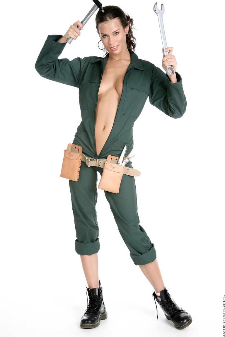15P Gorgeous brunette Marie removes a jumpsuit to pose nude in a toolbelt and Docs