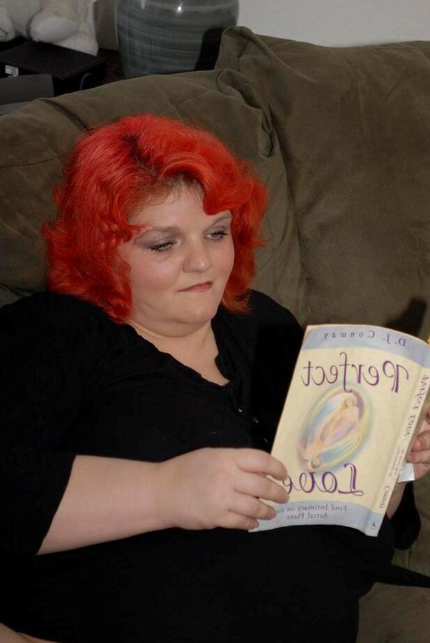 20P Obese older redhead Black Widow AK fondles herself while reading a romance