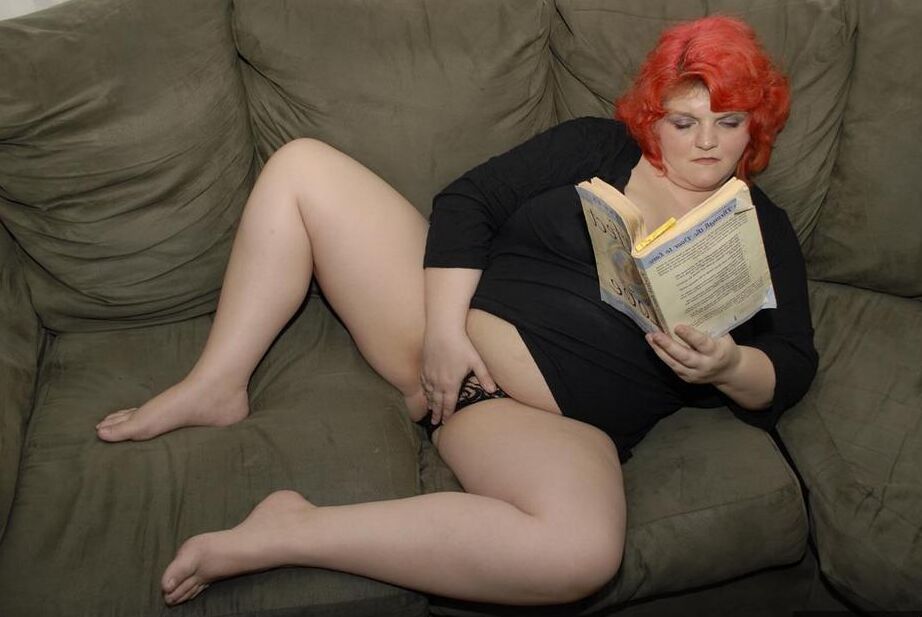 20P Obese older redhead Black Widow AK fondles herself while reading a romance