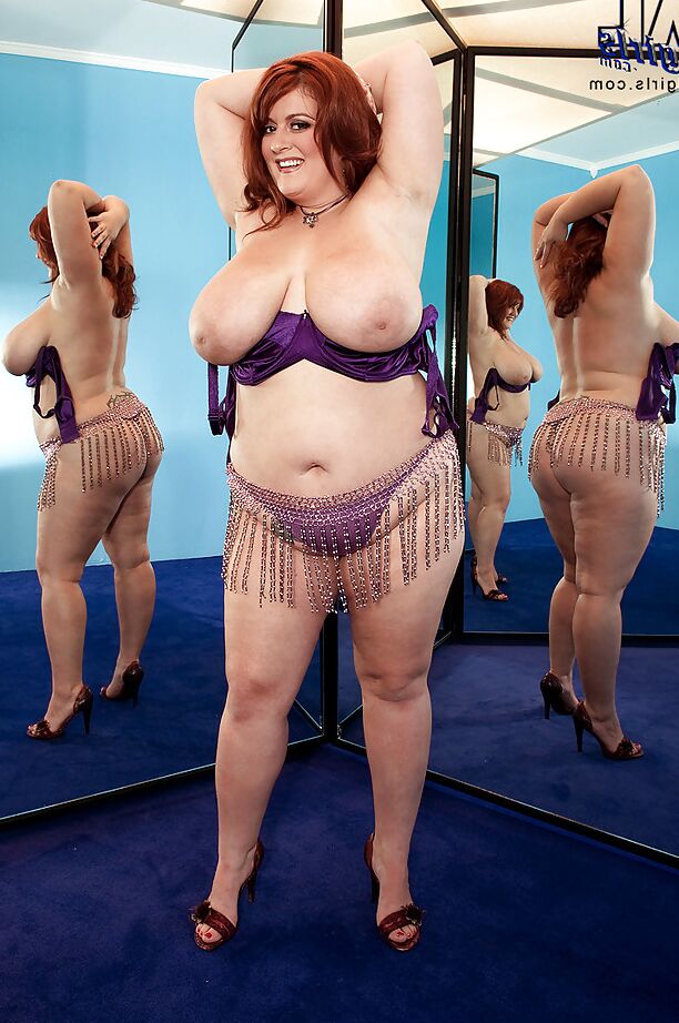16P Redhead fatty Jade Parker stripping and stuffing her snatch with a huge toy