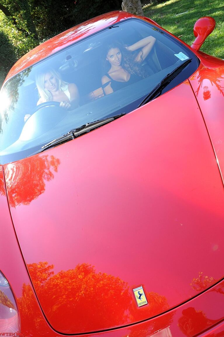 21P Danielle Maye and Krystal Webb lick each other's feet and twats on a sport car