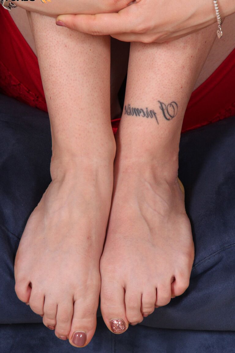 12P Clothed lesbians snuggle up against each other while showing their bare feet
