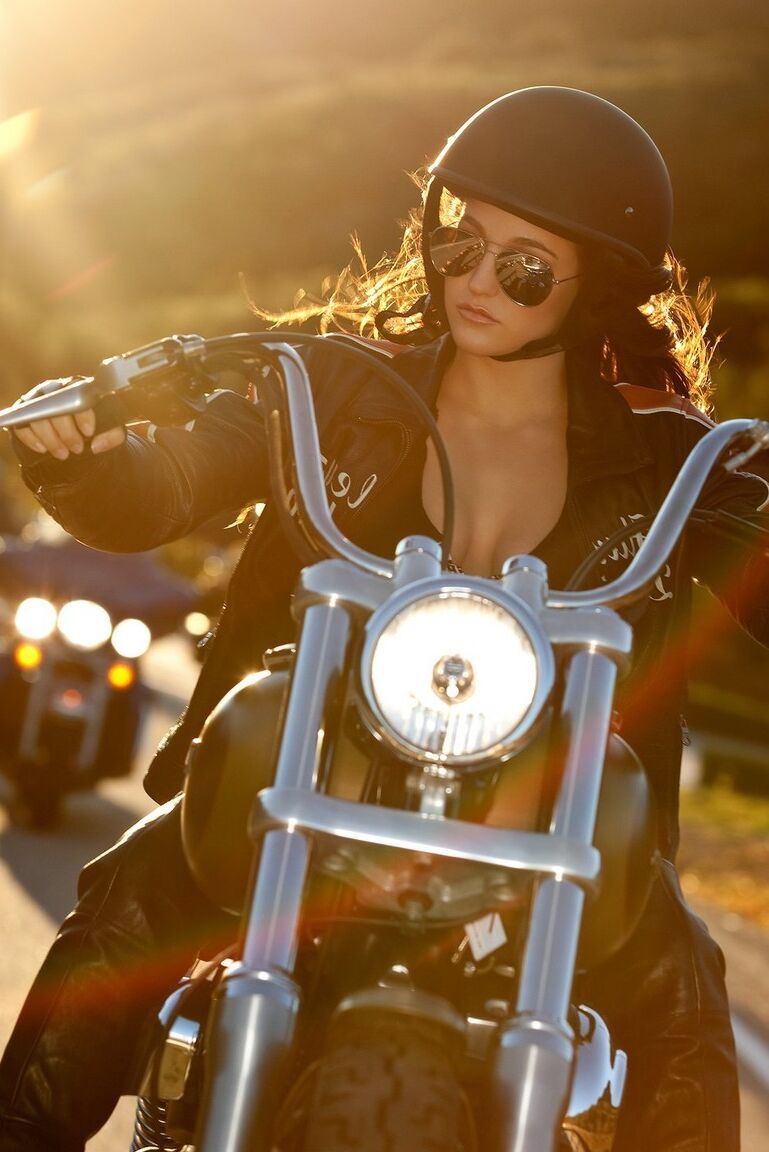 16P Remarkable brunette centerfold Jaclyn Swedberg poses topless on a motorcycle