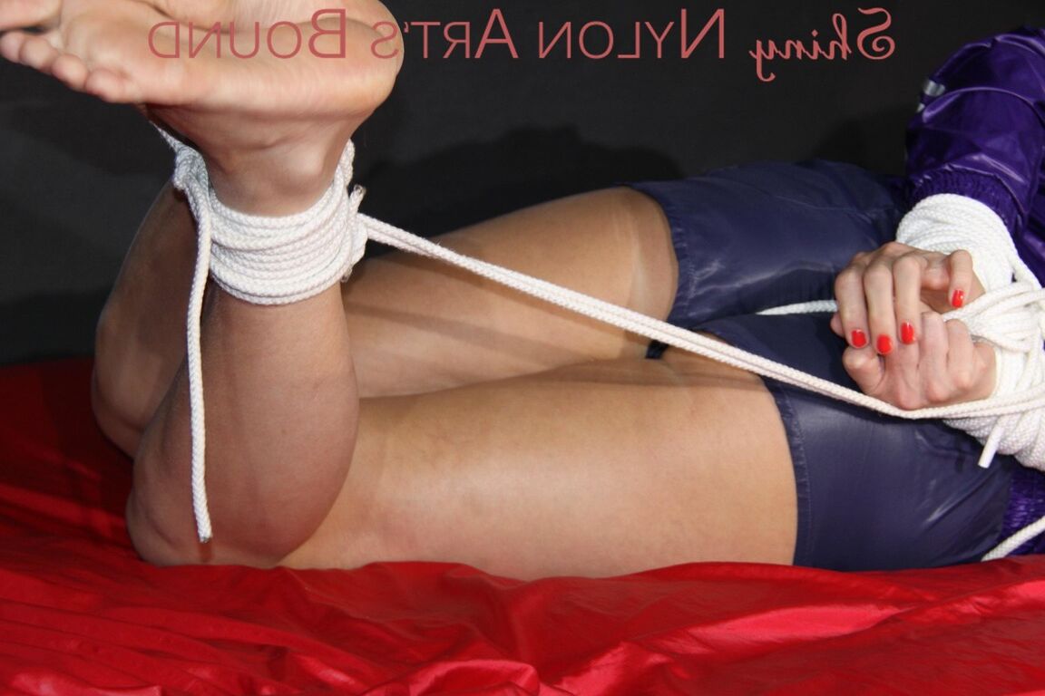 16P Sexy Pia being tied and gagged with ropes and a clothgag on a bed wearing a