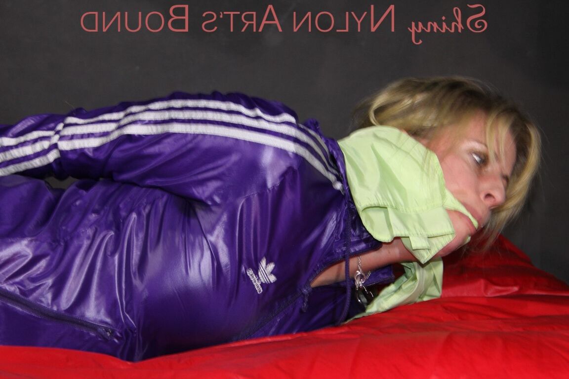 16P Sexy Pia being tied and gagged with ropes and a clothgag on a bed wearing a