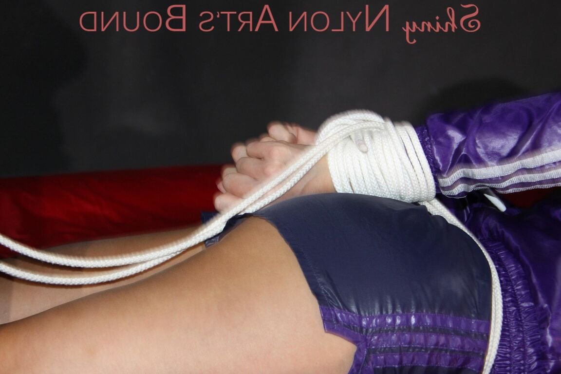 16P Sexy Pia being tied and gagged with ropes and a clothgag on a bed wearing a
