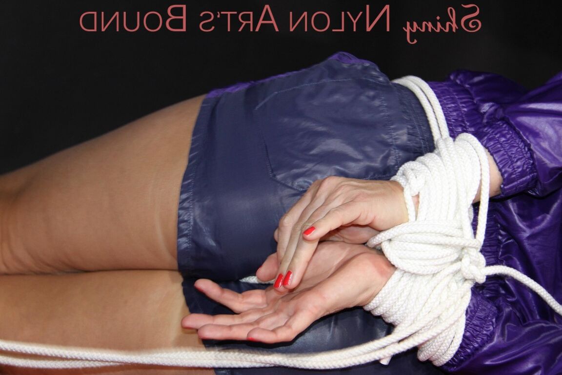 16P Sexy Pia being tied and gagged with ropes and a clothgag on a bed wearing a