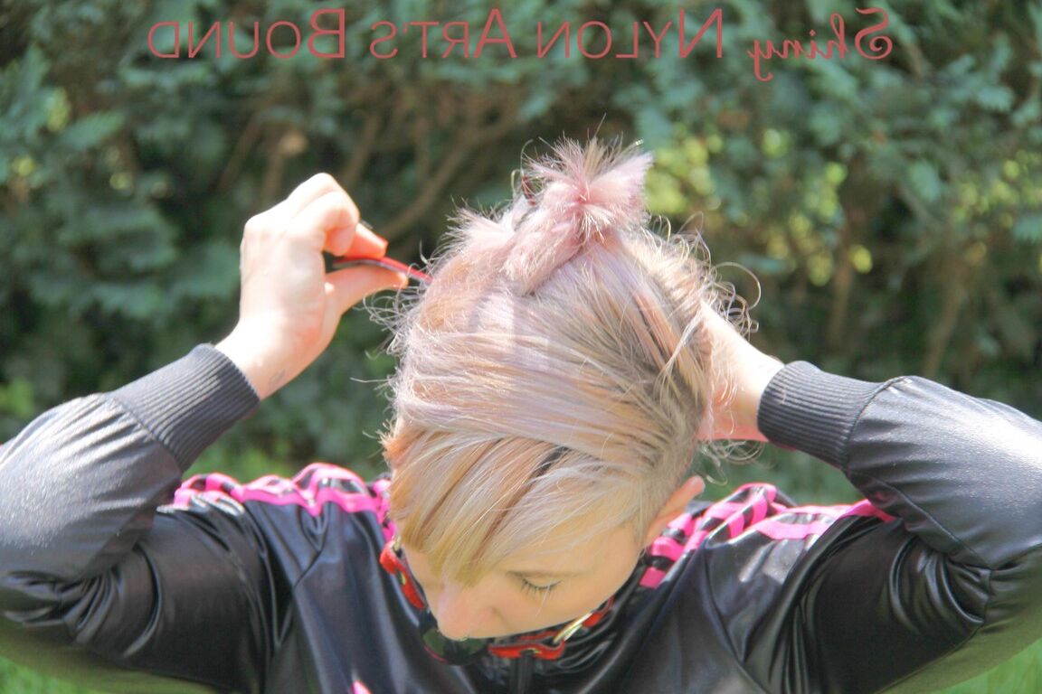 16P Mara ties and gagges herself in the garden with cuffs wearing a sexy new