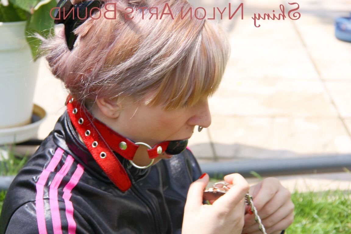 16P Mara ties and gagges herself in the garden with cuffs wearing a sexy new