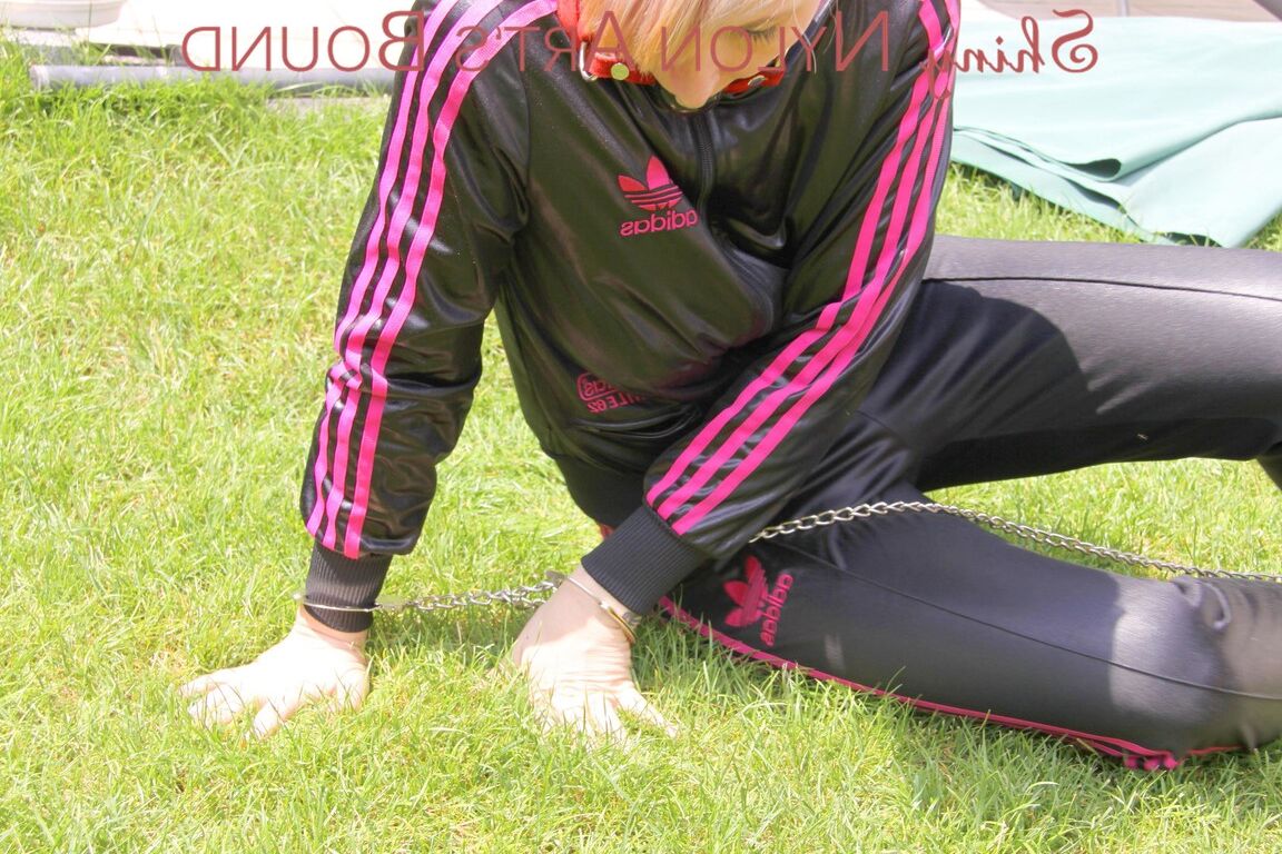 16P Mara ties and gagges herself in the garden with cuffs wearing a sexy new