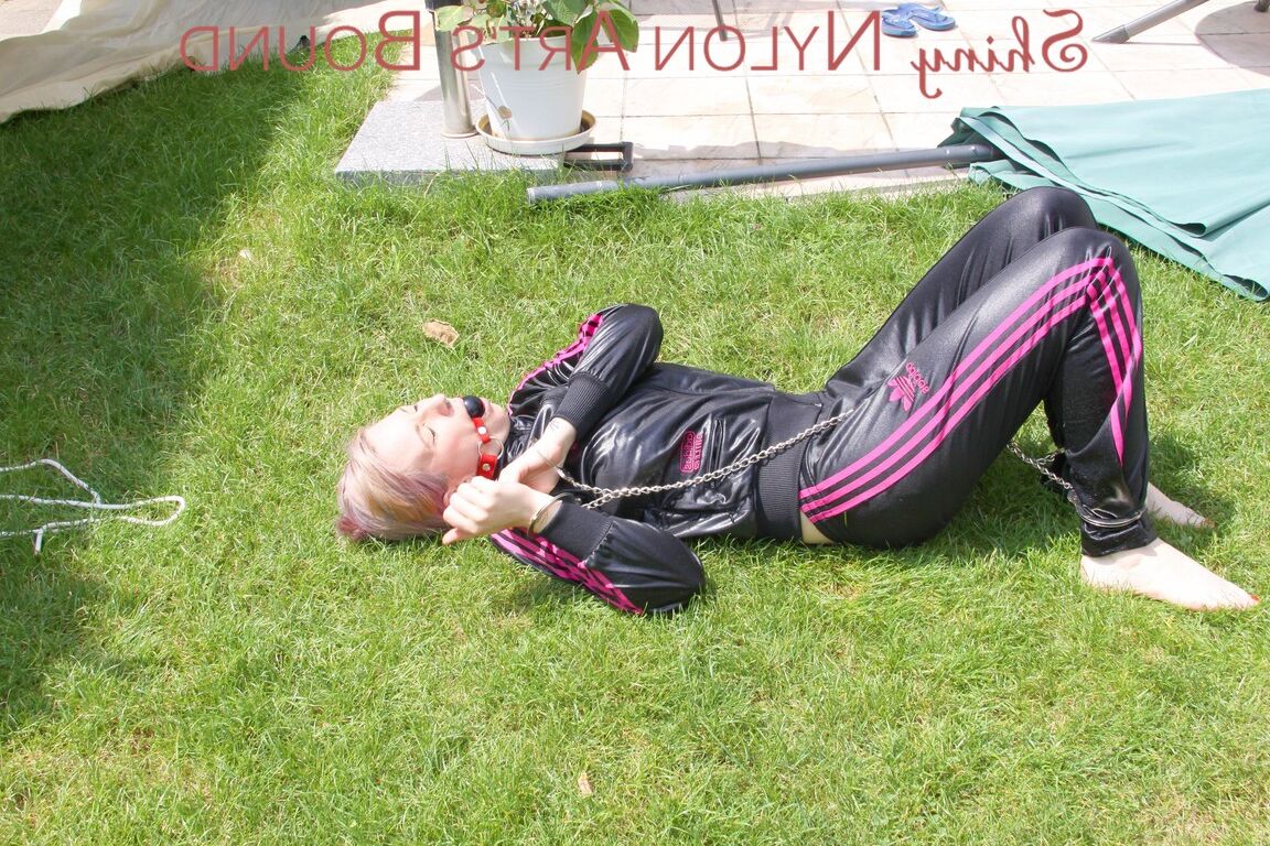 16P Mara ties and gagges herself in the garden with cuffs wearing a sexy new