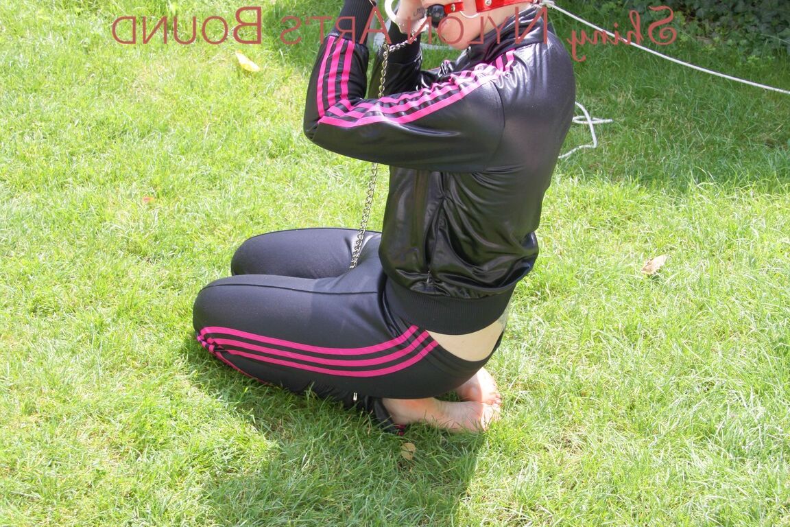 16P Mara ties and gagges herself in the garden with cuffs wearing a sexy new
