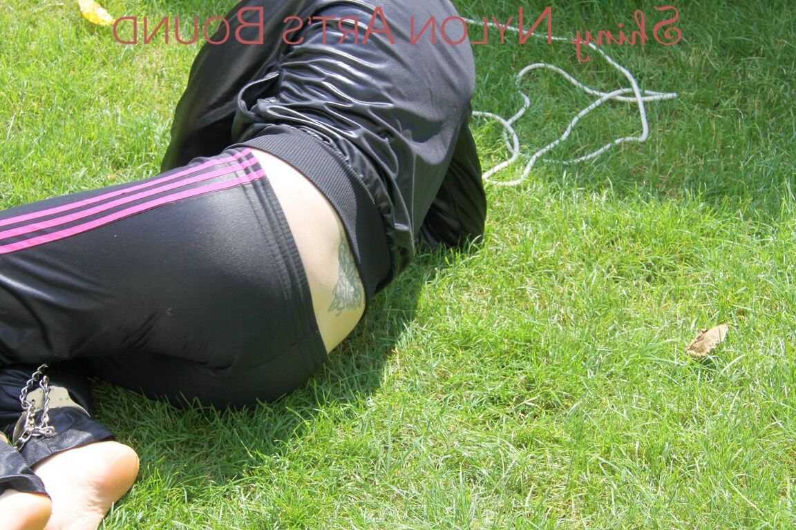 16P Mara ties and gagges herself in the garden with cuffs wearing a sexy new