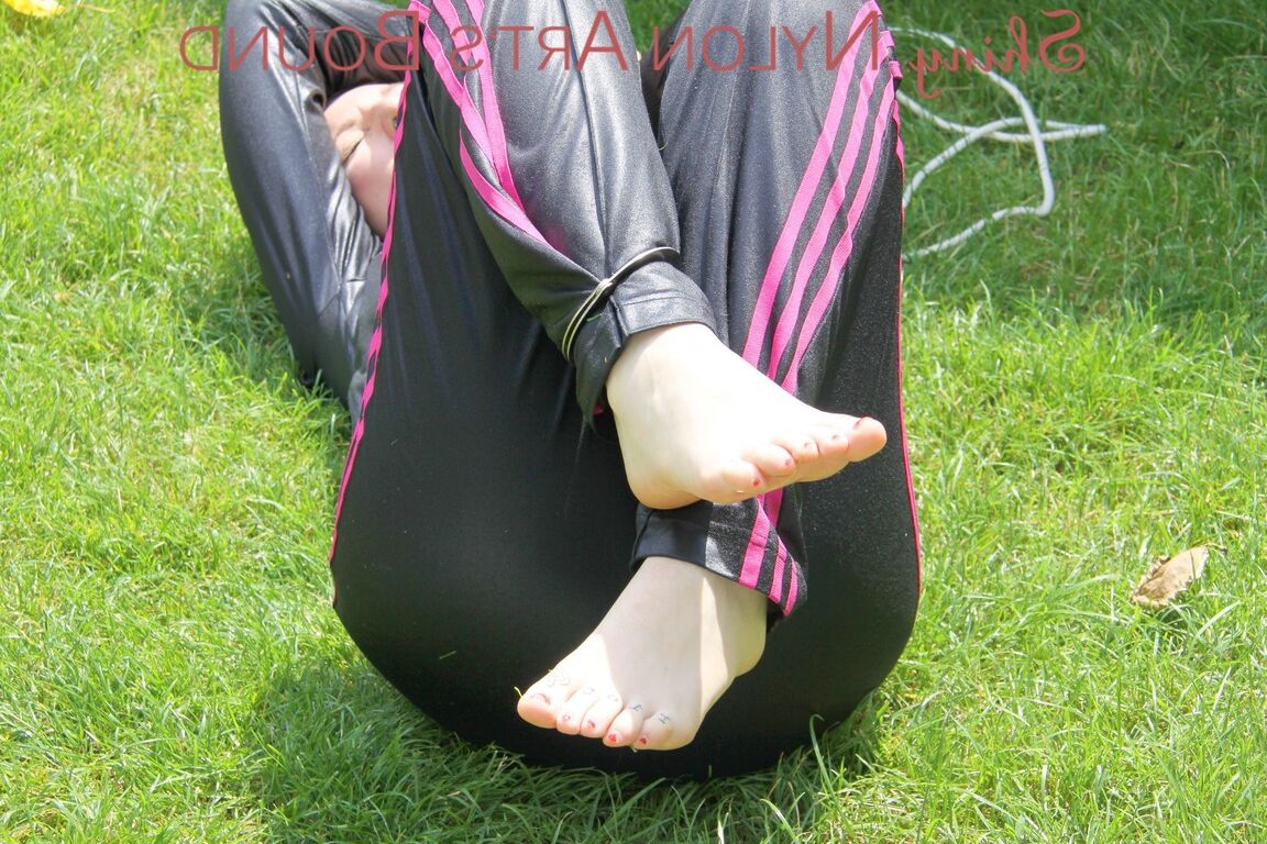 16P Mara ties and gagges herself in the garden with cuffs wearing a sexy new