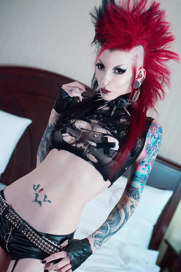 15P Tattooed punk Razor Candi sports a mohawk while showing her bald pussy