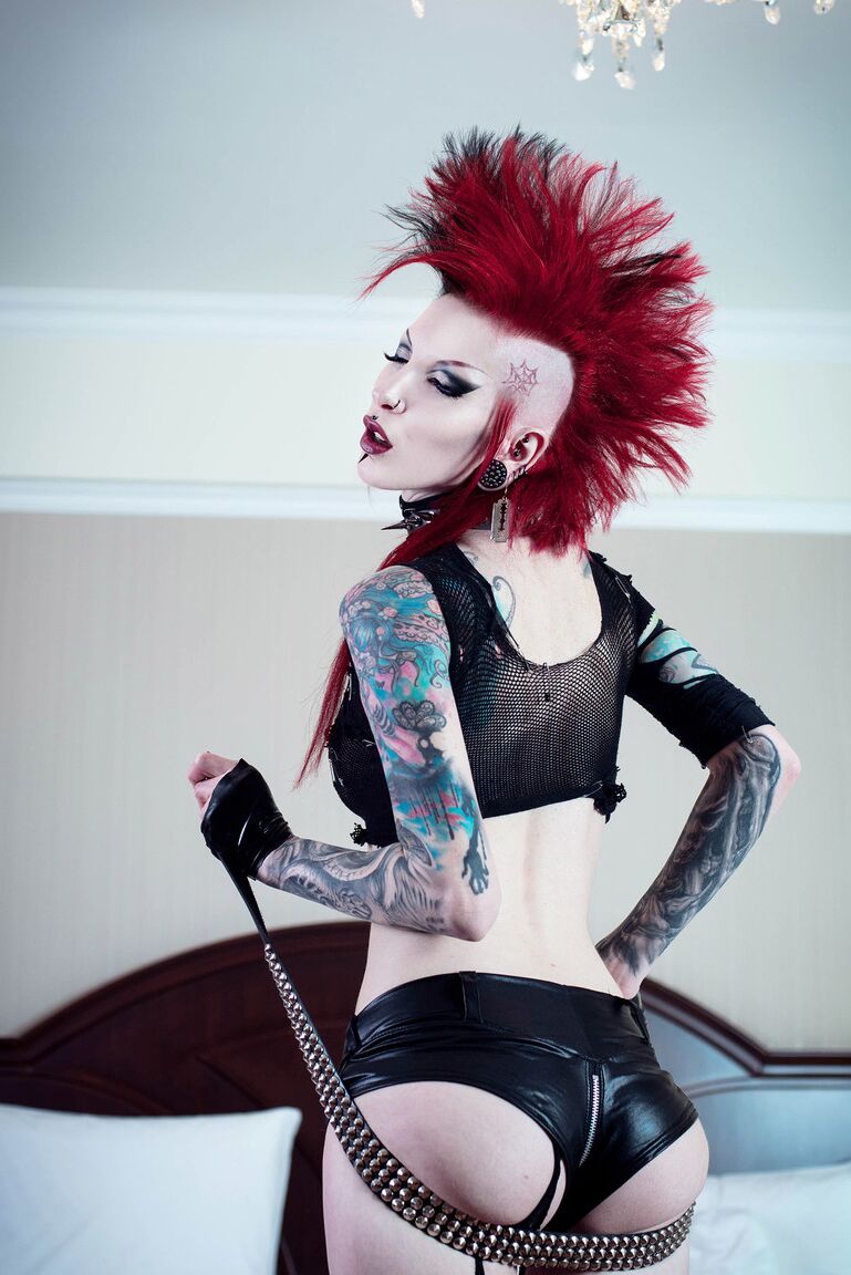 15P Tattooed punk Razor Candi sports a mohawk while showing her bald pussy
