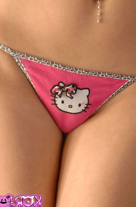 12P Redhead Korina Bliss strips to her hello kitty panties and fishnet kneehighs