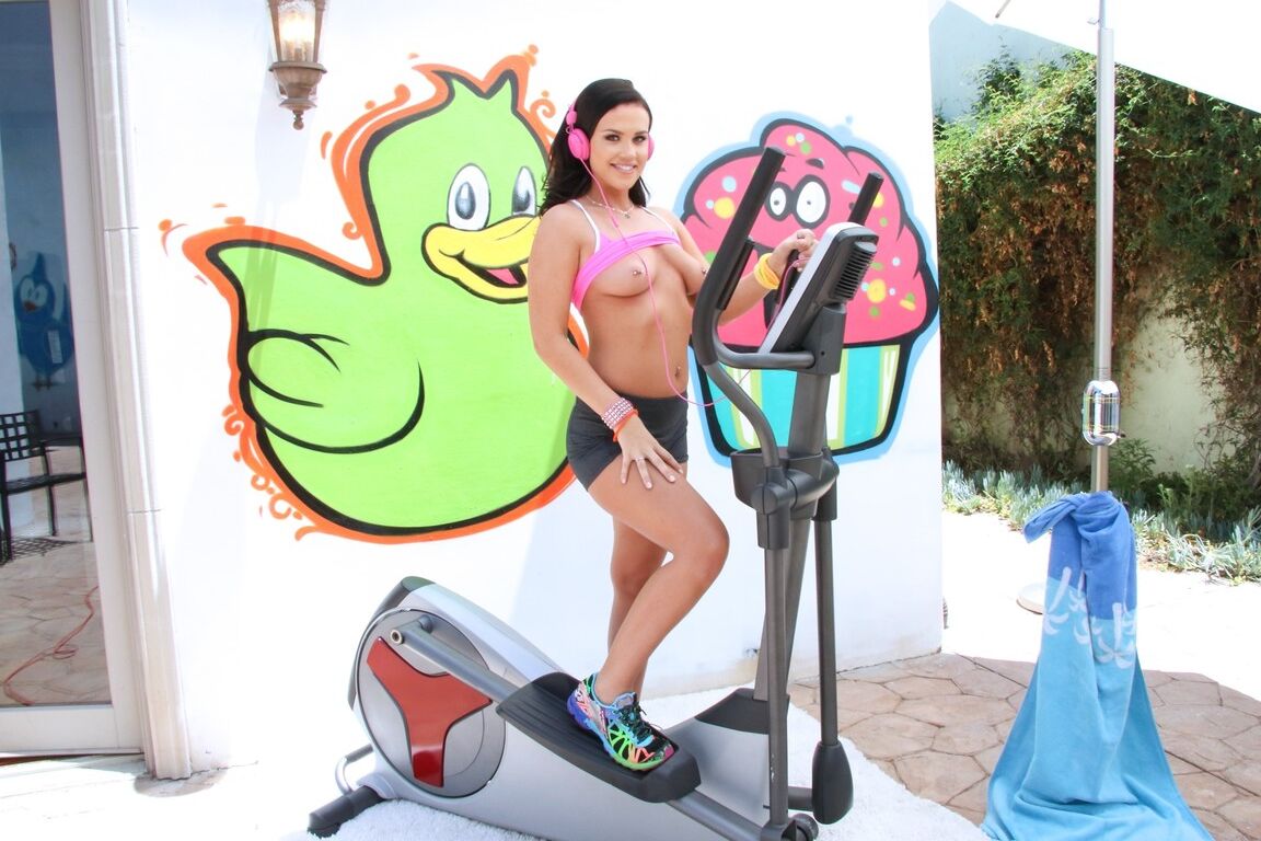 15P Athletic girl Roxy Raye stands naked after exercising on a patio