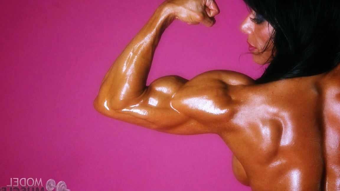 21P Bodybuilder with fake boobs Marina Lopez flaunts her shiny body in a solo