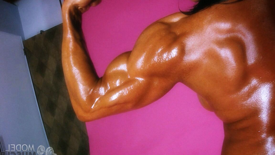 21P Bodybuilder with fake boobs Marina Lopez flaunts her shiny body in a solo