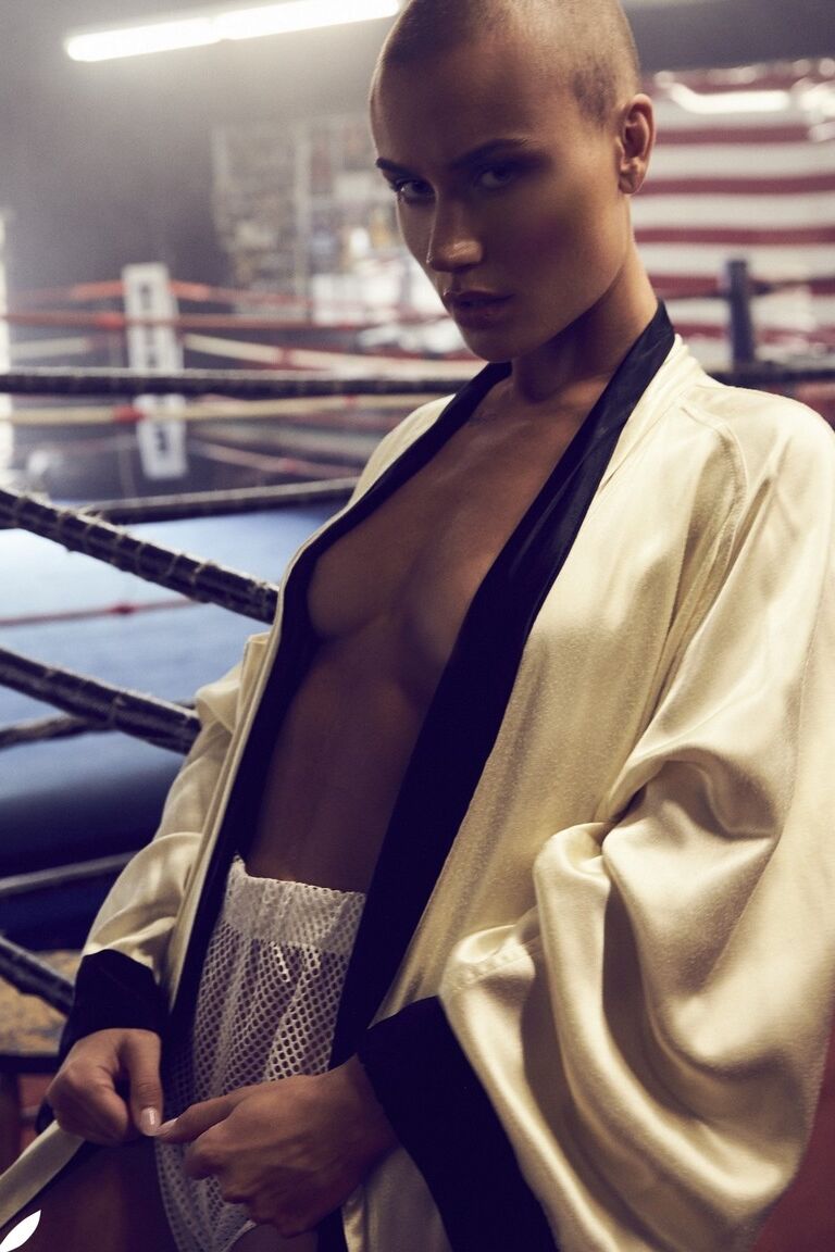 12P Athletic woman Vendela models semi-nude in boxing attire with a sweat on