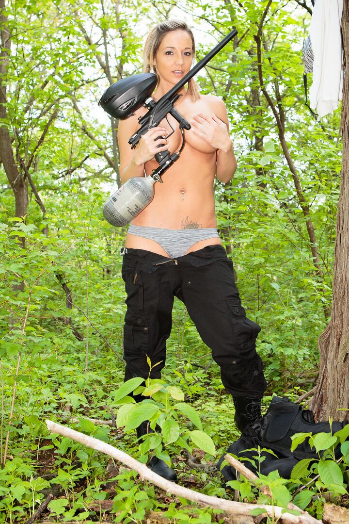 15P Amateur Nikki Sims in uniform getting naked in the woods showing hot ass