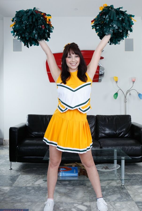 17P Brunette cheerleader takes off her uniform and gets banged in reverse cowgirl