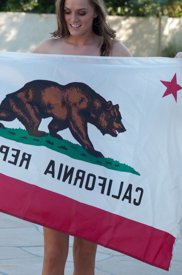 16P Tori naked playing with the flag of her home state