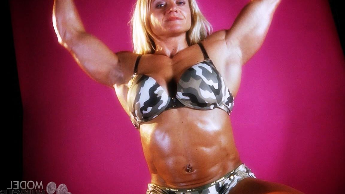 21P Sexy bodybuilder Brigita Brezovac displays her huge muscles while working out