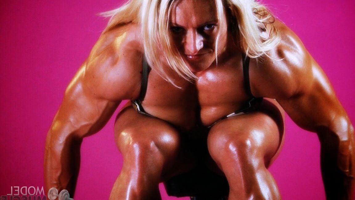 21P Sexy bodybuilder Brigita Brezovac displays her huge muscles while working out