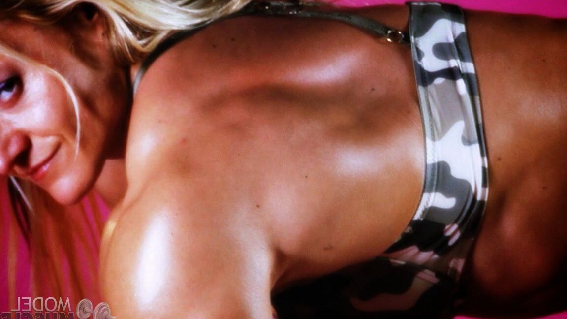 21P Sexy bodybuilder Brigita Brezovac displays her huge muscles while working out