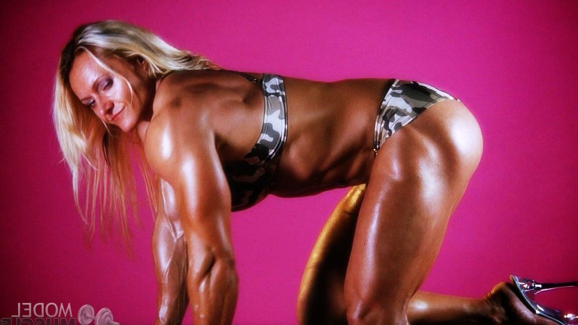 21P Sexy bodybuilder Brigita Brezovac displays her huge muscles while working out