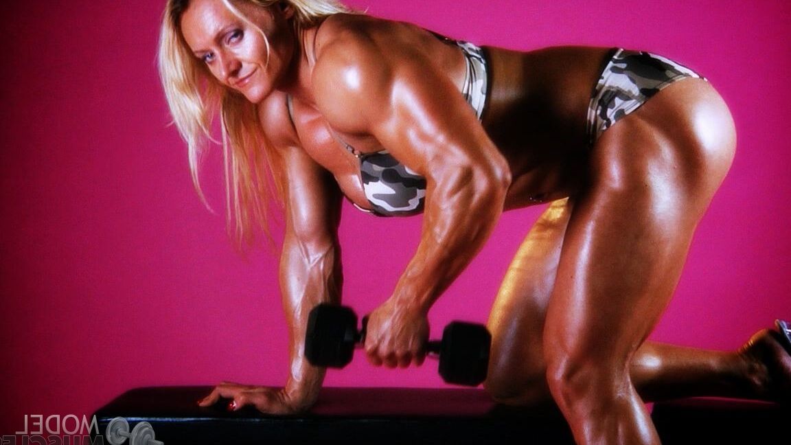 21P Sexy bodybuilder Brigita Brezovac displays her huge muscles while working out