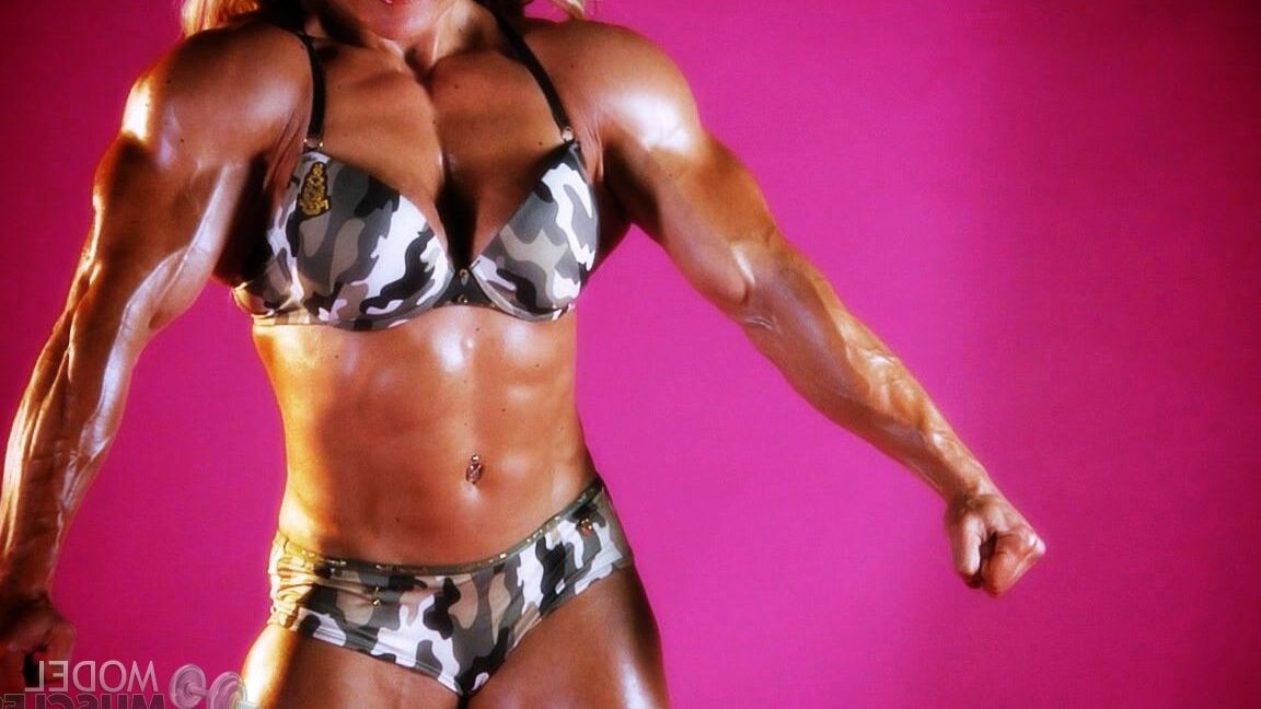 21P Sexy bodybuilder Brigita Brezovac displays her huge muscles while working out