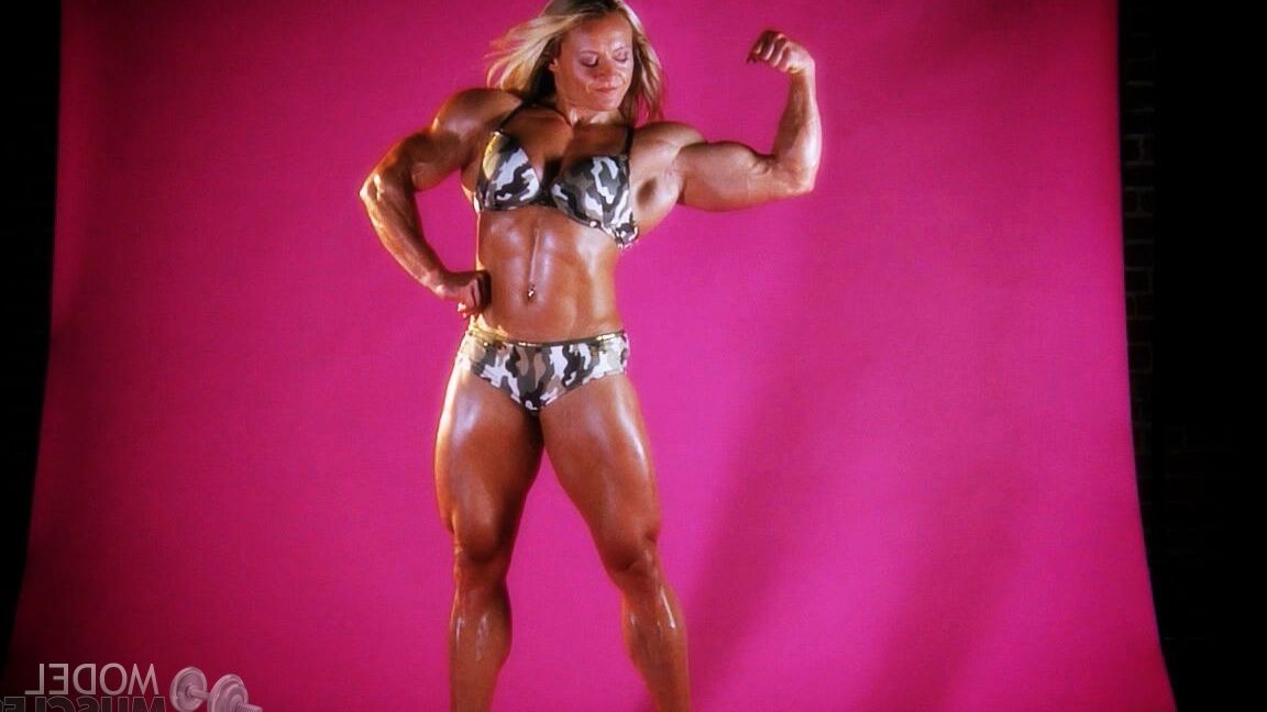 21P Sexy bodybuilder Brigita Brezovac displays her huge muscles while working out