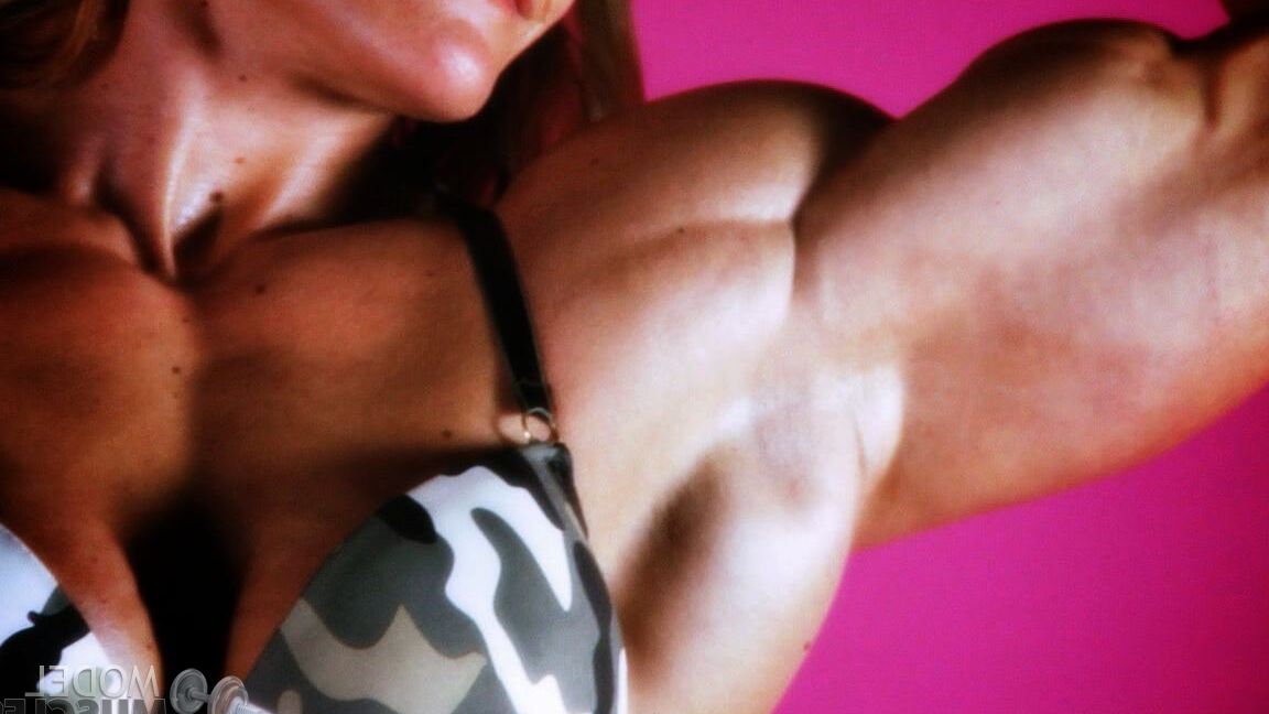 21P Sexy bodybuilder Brigita Brezovac displays her huge muscles while working out
