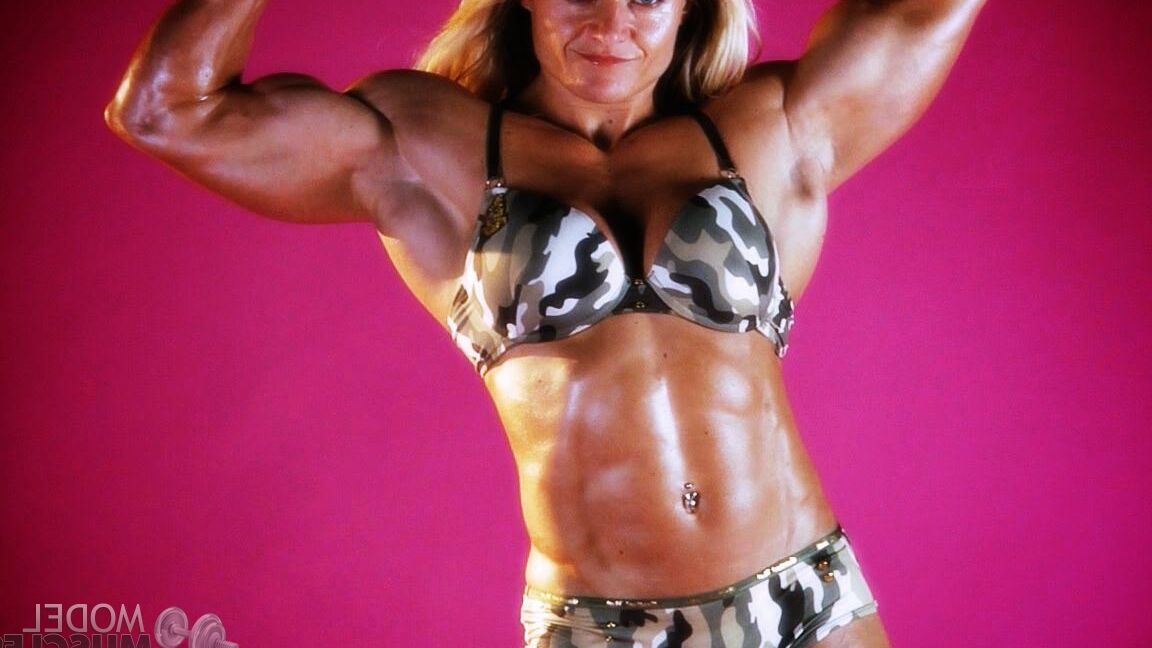 21P Sexy bodybuilder Brigita Brezovac displays her huge muscles while working out