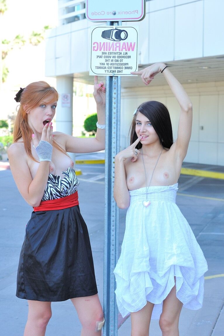 21P Sweet girls Lacie and Tamara strip and rub each other's hole in public