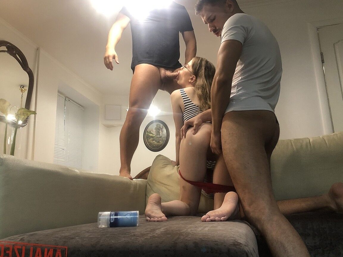 20P Nerdy teen Anna Rey enjoys a double penetration in a threesome with hung studs