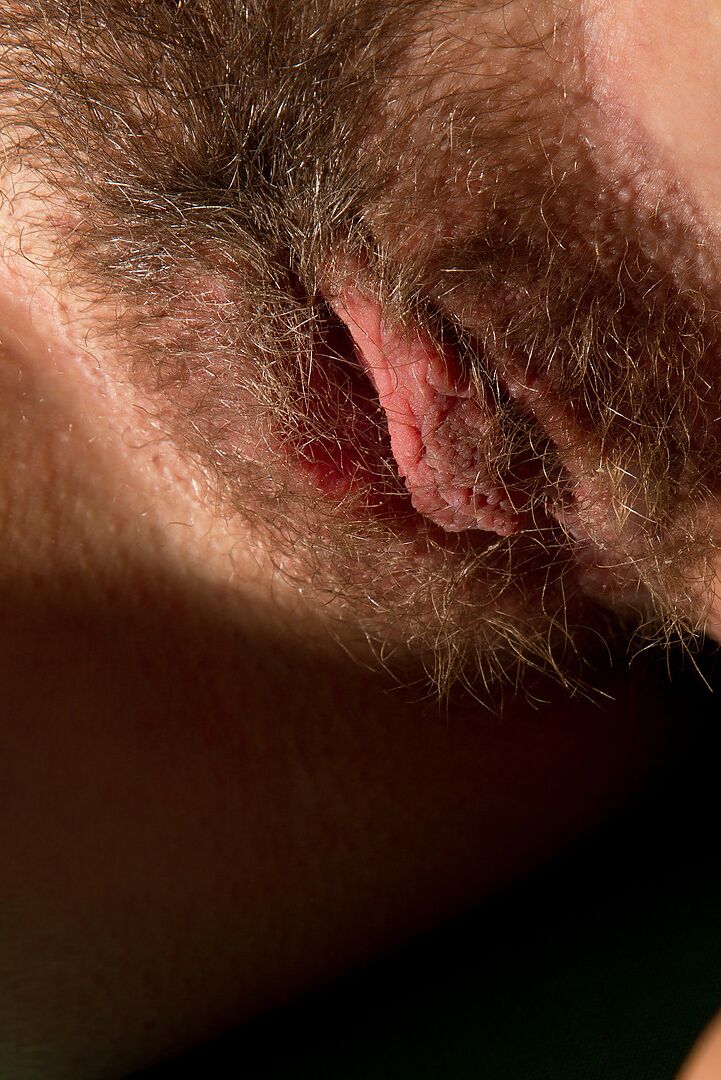 12P Youn blonde model poses nude on the pool table to display her hairy muff