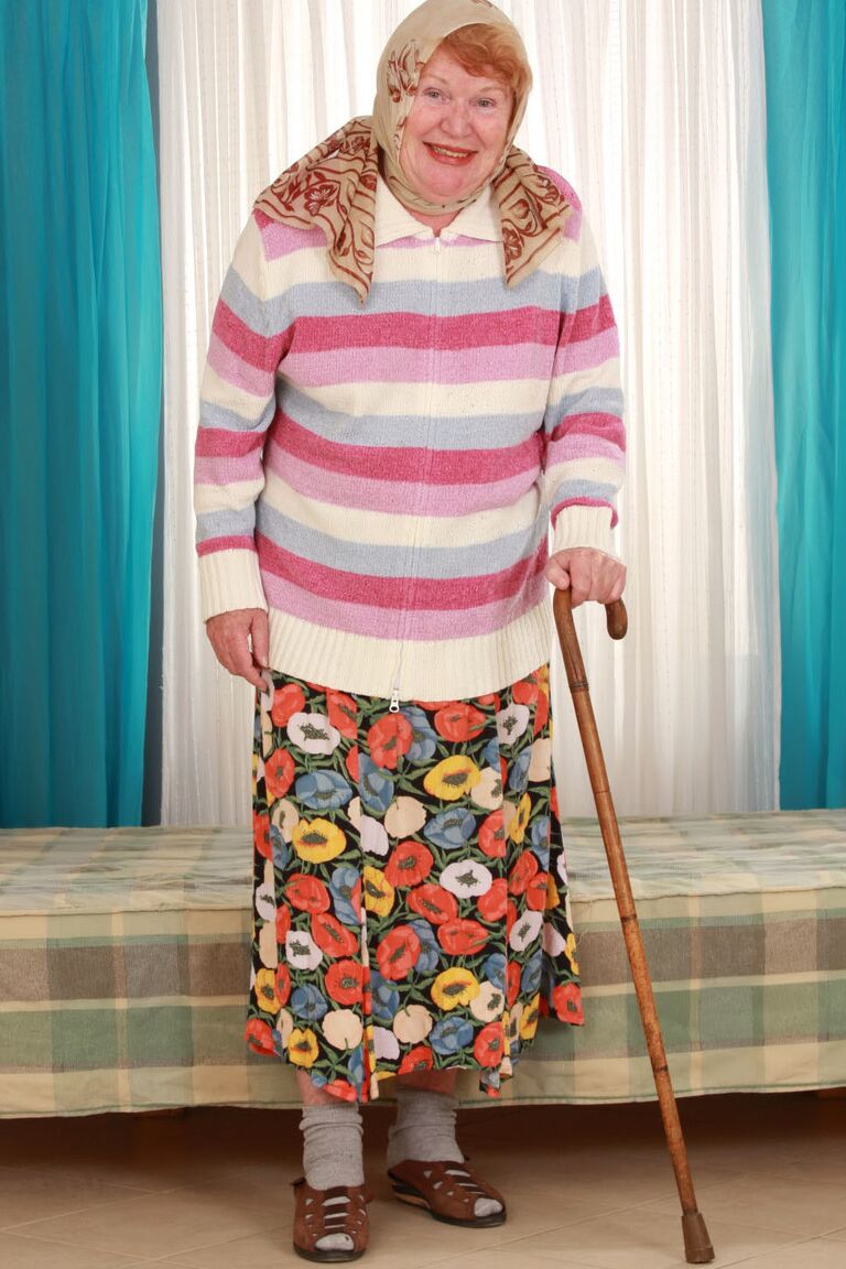 15P Fat old granny Alice with cane posing fully clothed in long skirt and socks