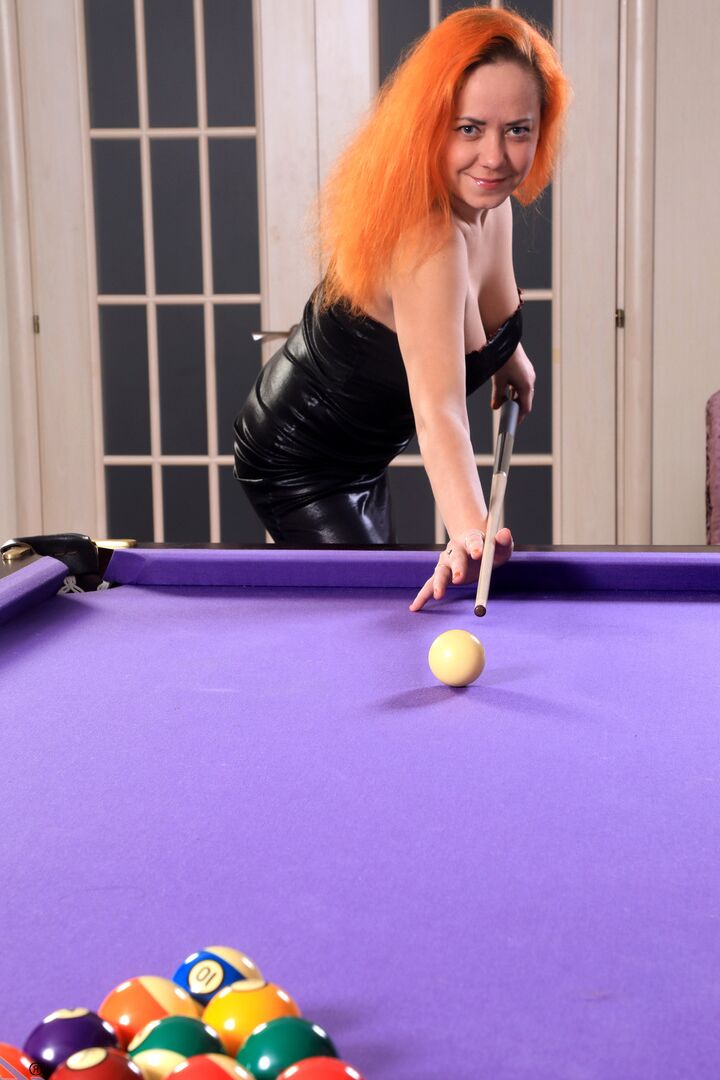 16P Redhead amateur Natali shows her bush on a pool table after getting naked