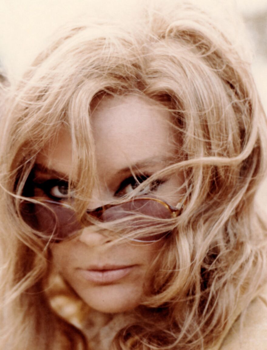 12P German Playboy model Elke Sommer getting wet and posing nude in nature