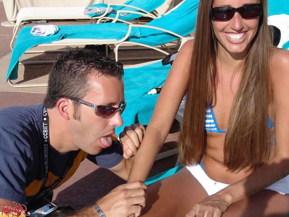 15P Fully clothed female Lori Anderson has her hairy arms licked near a pool