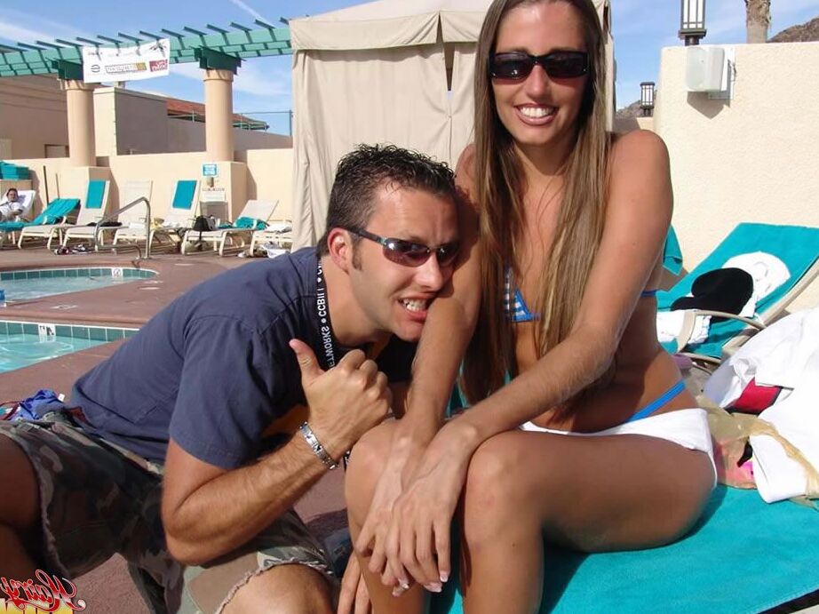 15P Fully clothed female Lori Anderson has her hairy arms licked near a pool
