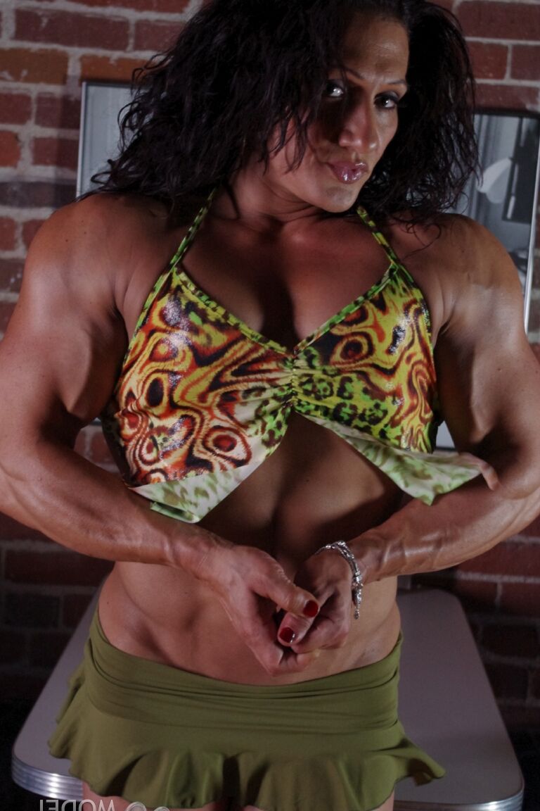 21P Sizzling hot bodybuilder Tonia Moore flaunts her muscles & sexy ass in a thong