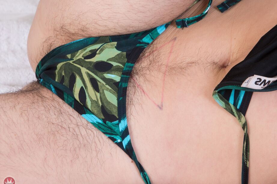 16P Older hirsute woman Stacey Stax models in the nude after bikini tossing