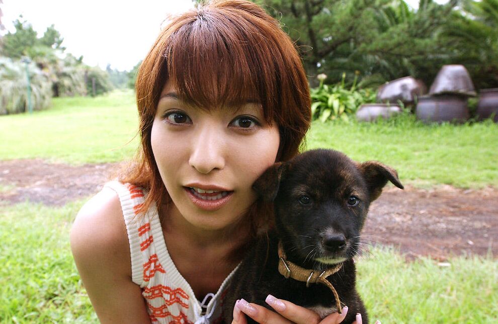 16P Japanese redhead An Naba gets totally naked while playing with puppies