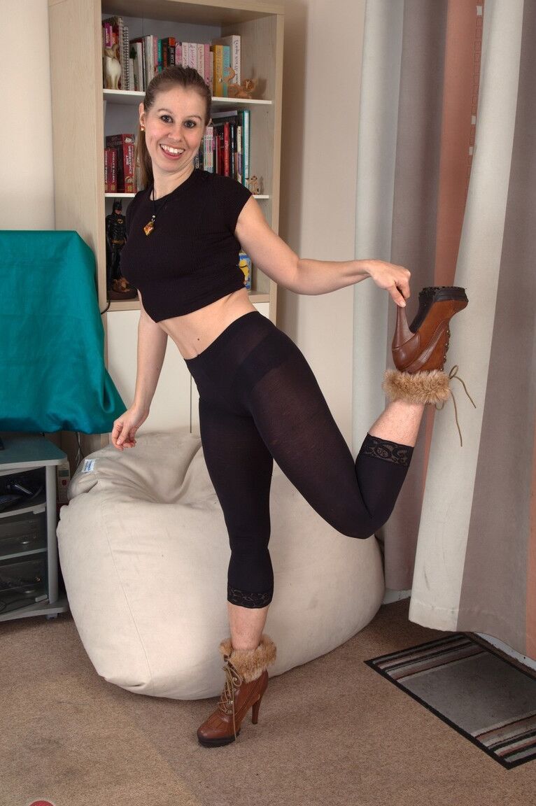 21P Skinny mature Masie Dee doffs her nylons and shows off her bushy cunt