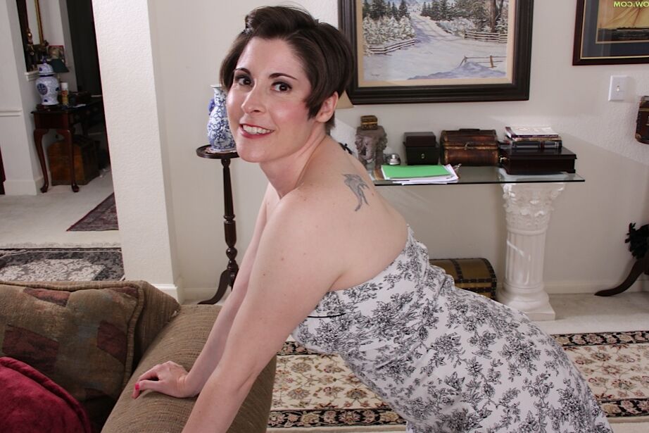 16P Aged solo model Sadie Jones flashing upskirt thigh and hose in red heels